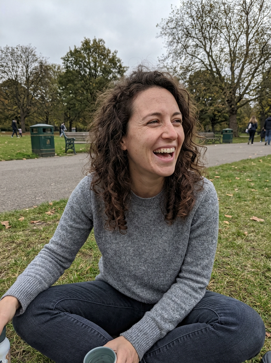 Nia, 31, a chef laughing in a park — sample Krovo profile